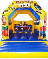 blue and yellow pirate themed bouncy castle for hire