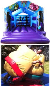 purple adult bouncy castle and two adult wearing sumo suits